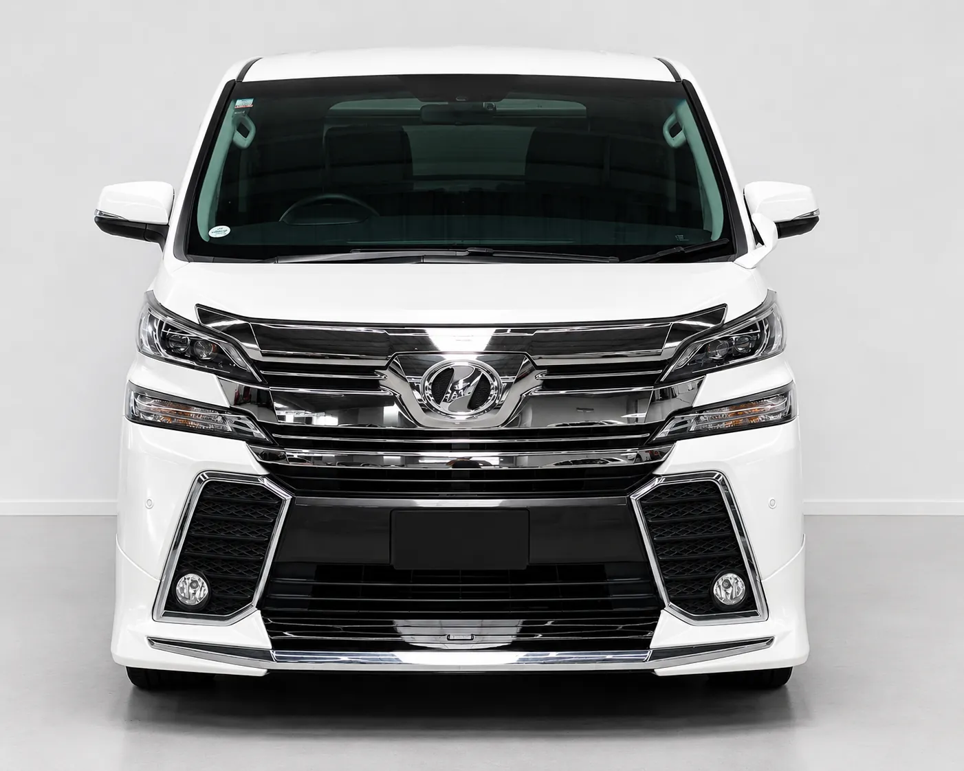 White luxury minivan available for car hire services in Christchurch, ideal for family travel and group transportation.