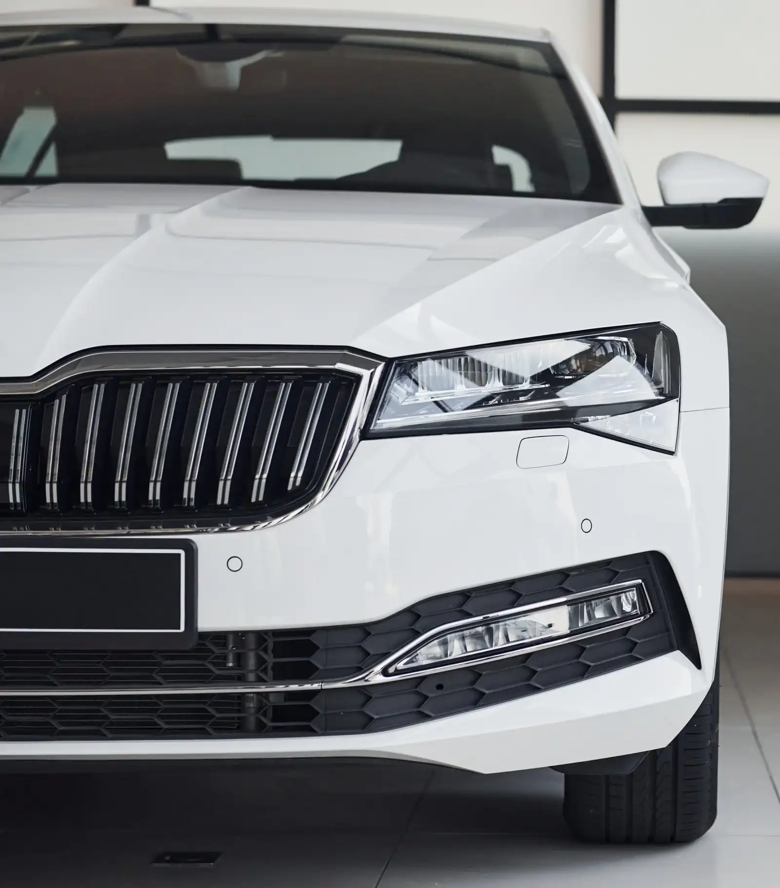Modern white sedan offered by car hire services in Christchurch for business trips, airport transfers, and city driving.